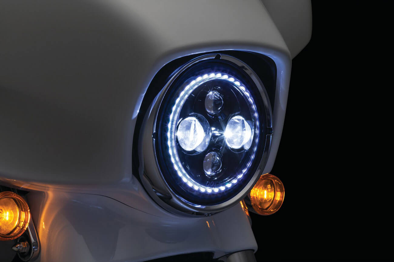 White L.E.D. halo headlight on white motorcycle