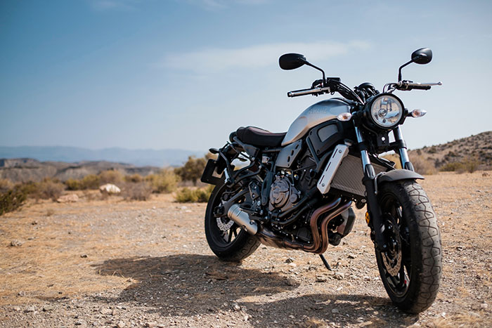 A Yamaha cruiser parked in the desert