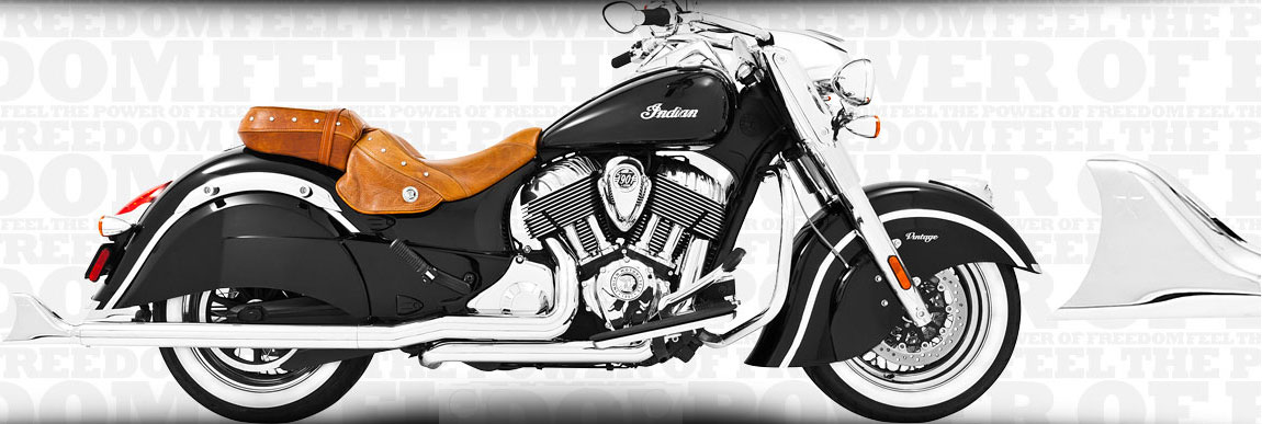 Black and chrome Indian motorcycle with brown leather seat