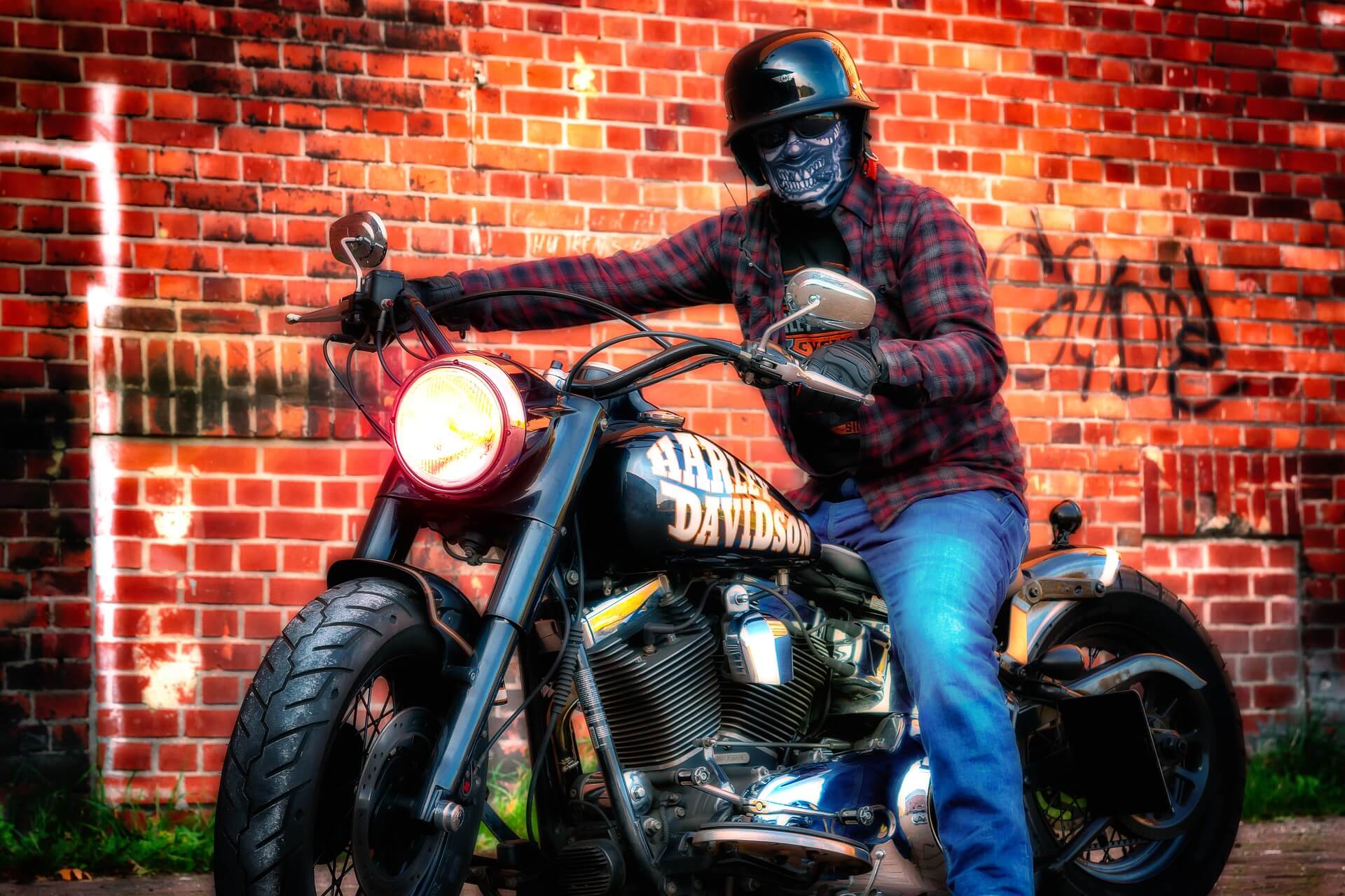 Man in a mask on a motorcycle