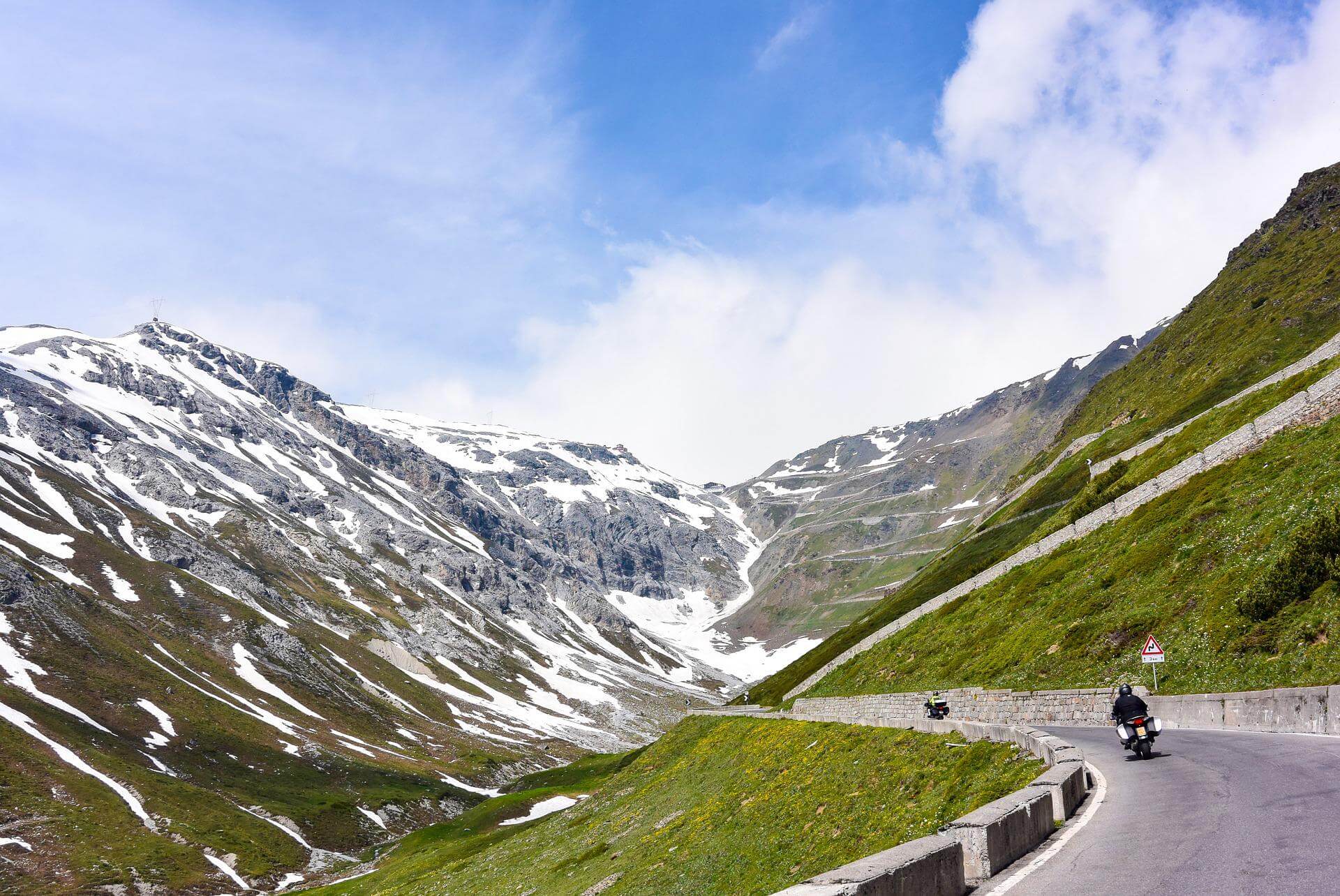 Motorcycle riders on a roadtrip in the mountains