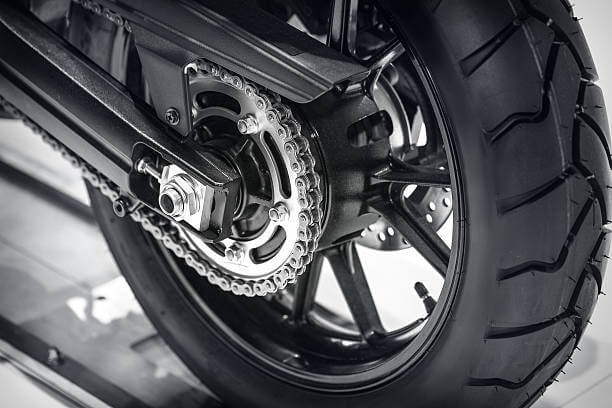 Black and white close-up photo of a motorcycle tire