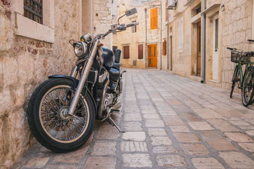 a parked bike on a street