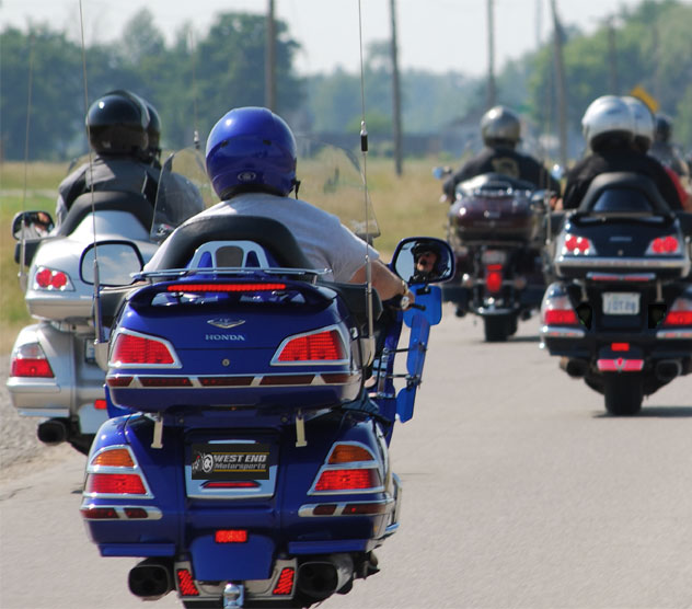 bunch of riders going on a road trip